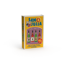 Cargar imagen en el visor de la galería, A set of four miniature plastic bottles in different colors packaged in a box with &#39;Sam &amp; Julia&#39; branding and illustrations of the bottles.
